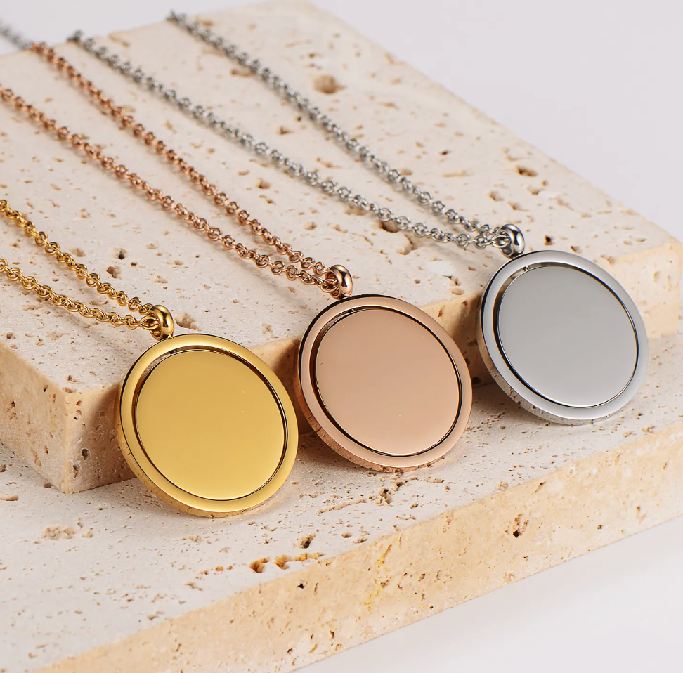 Custom round spinner pendant necklace with personalized engraving, made in the USA