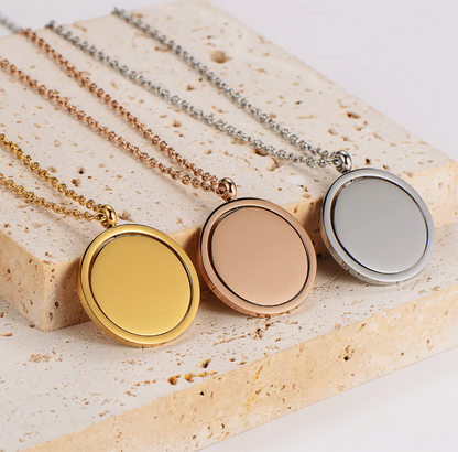 Custom round spinner pendant necklace with personalized engraving, made in the USA
