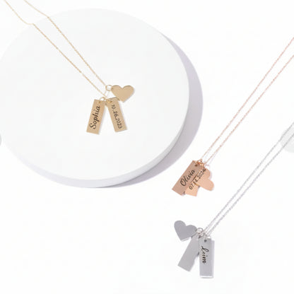 Gold personalized heart and name bar necklace engraved Sophia and dated 10.26.2023, shown with rose gold and silver versions